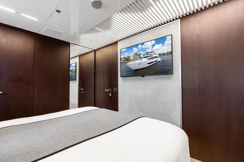 Slide: The Image of Luxurious bedroom interior on 2018 Ferretti Yachts 850 Motoryacht with modern design elements. - 69