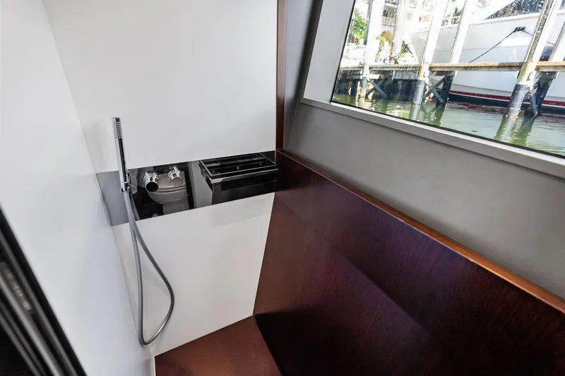 Slide: The Image of Interior of 2018 Ferretti Yachts 850 Motoryacht with modern shower and window view. - 77