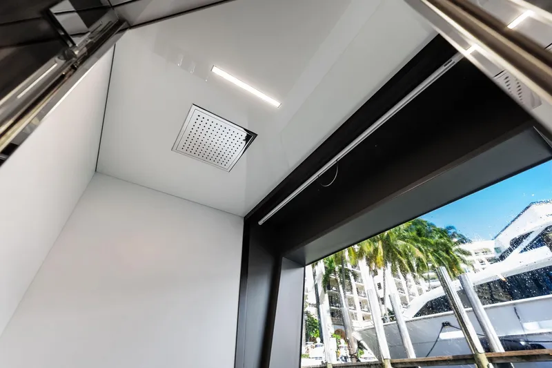 Slide: The Image of Interior view of 2018 Ferretti Yachts 850 Motoryacht with modern shower and window. - 80