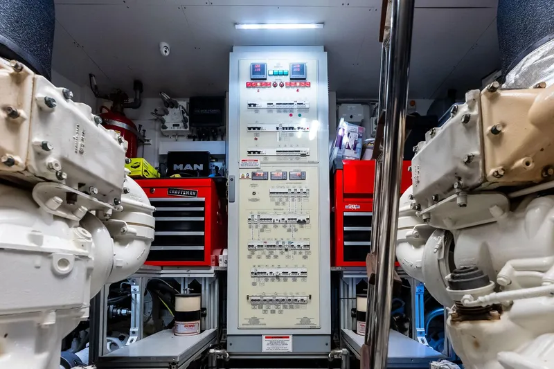 Slide: The Image of Engine room of 2018 Ferretti Yachts 850 Motoryacht with control panel and machinery. - 84
