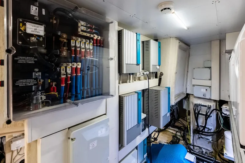 Slide: The Image of Electrical control room of 2018 Ferretti Yachts 850 Motoryacht, featuring panels and wiring. - 87