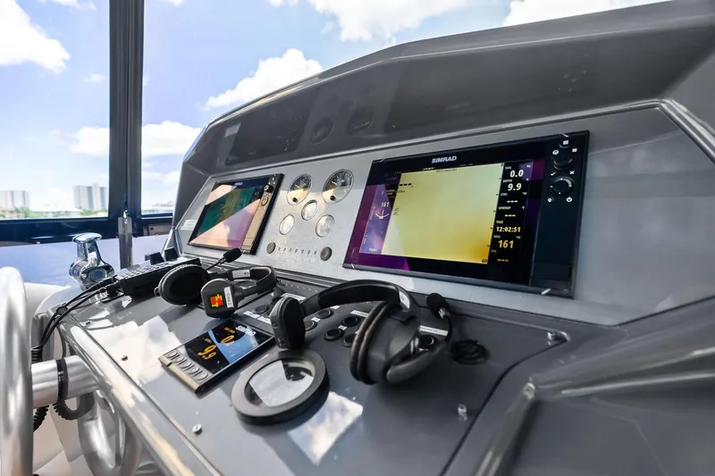 Slide: The Image of Control panel of 2018 Ferretti Yachts 850 Motoryacht with navigation screens and equipment. - 18