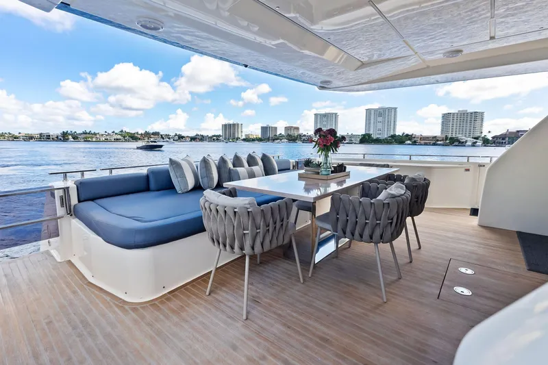 Slide: The Image of Luxurious deck of 2018 Ferretti Yachts 850 Motoryacht with elegant seating and scenic water view. - 33