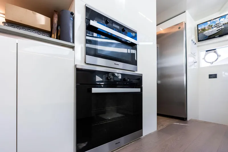 Slide: The Image of Modern kitchen in 2018 Ferretti Yachts 850 Motoryacht with Miele appliances. - 52