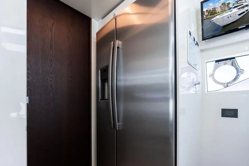 Slide: The Image of Modern kitchen area in 2018 Ferretti Yachts 850 Motoryacht with stainless steel refrigerator. - 53