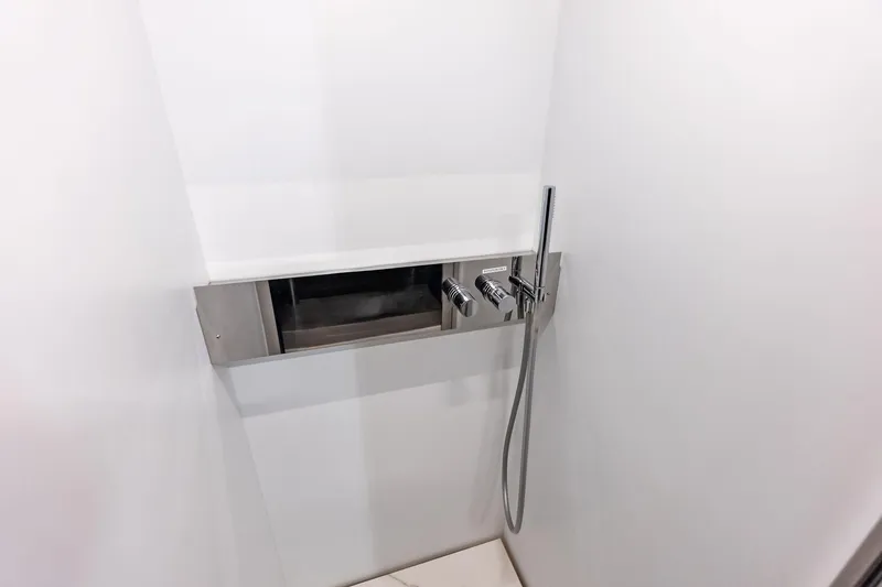 Slide: The Image of Modern shower controls in 2018 Ferretti Yachts 850 Motoryacht bathroom. - 73