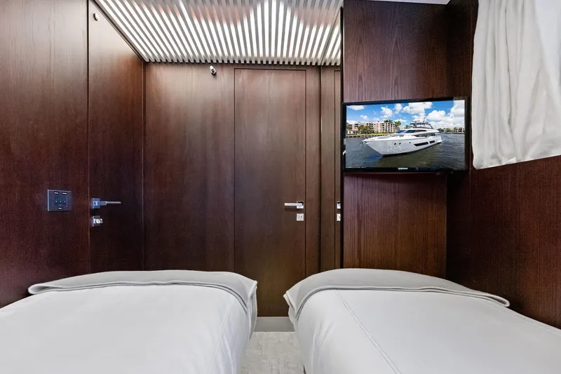 Slide: The Image of Luxurious cabin interior of 2018 Ferretti Yachts 850 Motoryacht with twin beds and TV. - 75