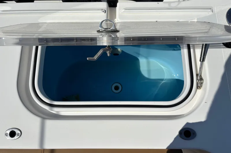 Slide: The Image of Control panel of 2019 Fountain 38 CC LS boat with dual Garmin displays. - 3