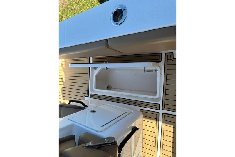 Slide: The Image of 2019 Fountain 38 CC LS boat bathroom interior with toilet and sink. - 7