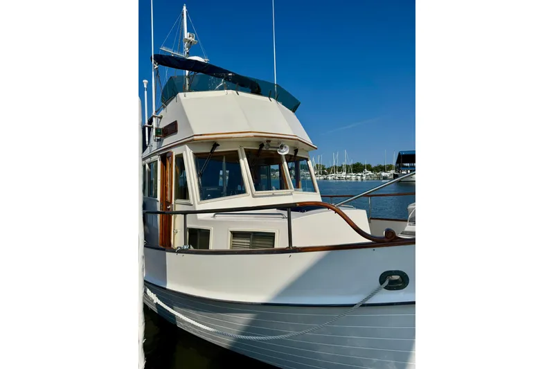 Slide: The Image of Bathroom interior of 1990 Grand Banks 36 Classic yacht, featuring sink and toilet. - 13