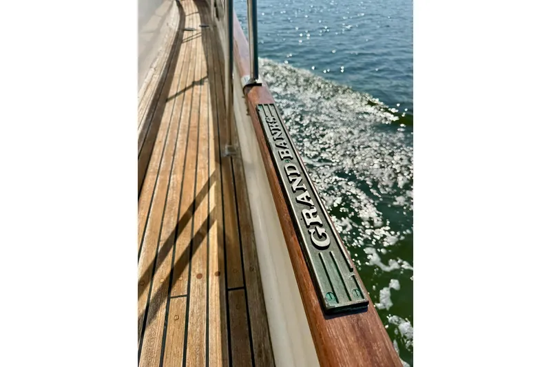 Slide: The Image of Bow of 1990 Grand Banks 36 Classic yacht with anchor and winch system. - 21