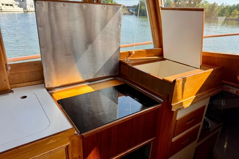 Slide: The Image of Engine room of 1990 Grand Banks 36 Classic with fuel management panel. - 47