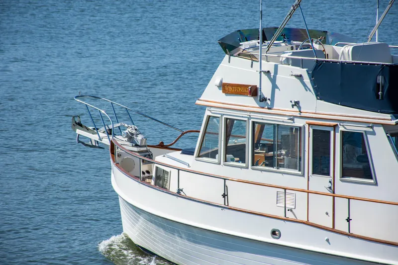 Slide: The Image of Interior of 1990 Grand Banks 36 Classic yacht with wooden cabinetry and ocean view. - 6