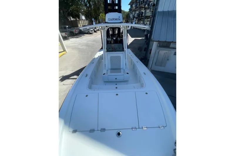 Slide: The Image of 2015 Barker Boatworks 26 Bay interior with Ionic battery and storage compartment. - 9