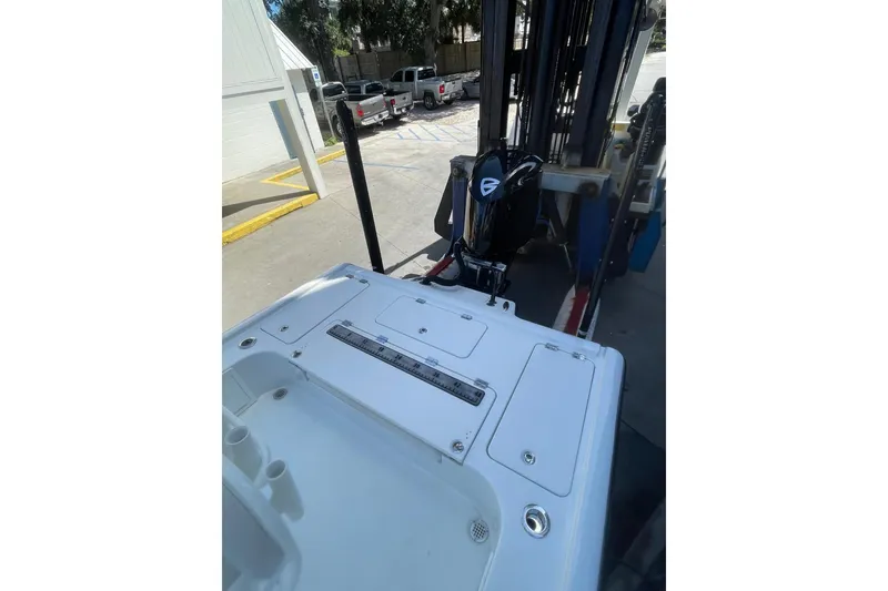 Slide: The Image of Control panel on a 2015 Barker Boatworks 26 Bay, featuring Ultraflex buttons. - 23