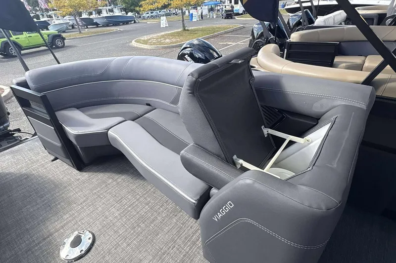 Slide: The Image of Luxurious seating on 2026 Viaggio D26U boat, featuring sleek gray upholstery and modern design. - 17
