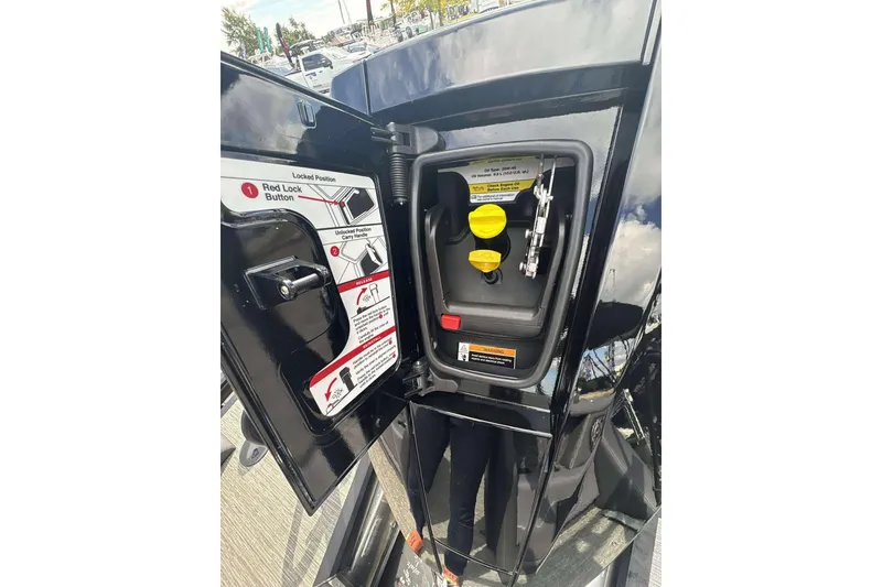 Slide: The Image of Open fuel compartment of 2026 Viaggio D26U with instructions and yellow caps visible. - 24