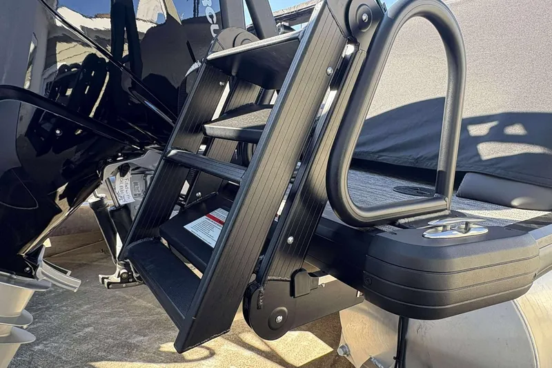 Slide: The Image of 2026 Viaggio D26U boat with foldable boarding ladder and sleek black design. - 27