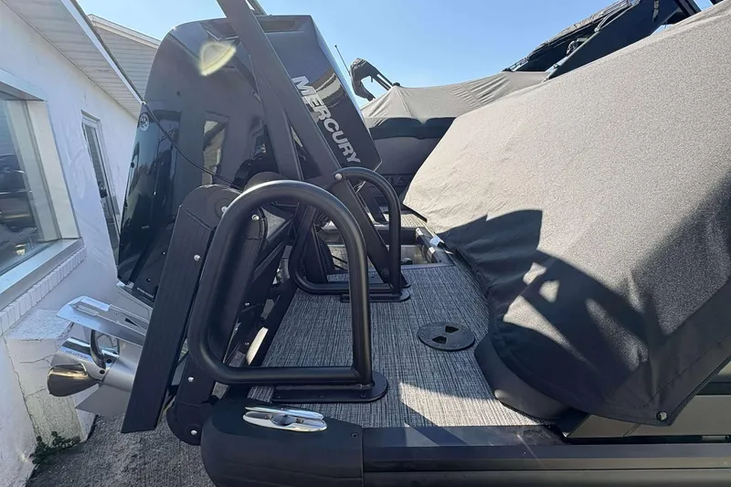 Slide: The Image of 2026 Viaggio D26U boat with Mercury engine, covered deck, and sleek design. - 28