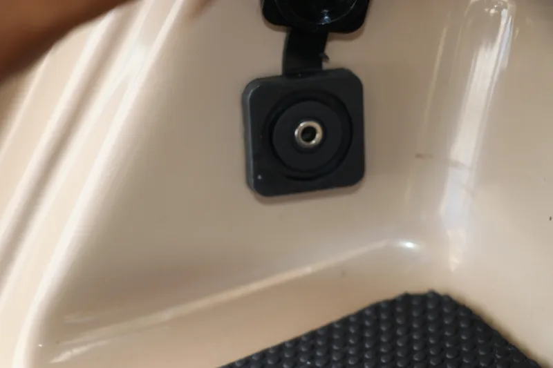 Slide: The Image of 2021 Chaparral 23 SSi OB boat interior detail with black socket. - 43