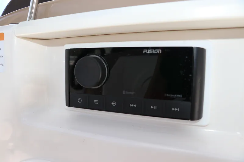 Slide: The Image of Fusion audio system on 2021 Chaparral 23 SSi OB boat dashboard. - 44