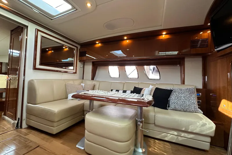 Slide: The Image of Luxurious interior of 2009 Sea Ray 48 Sundancer yacht with plush seating and elegant decor. - 15