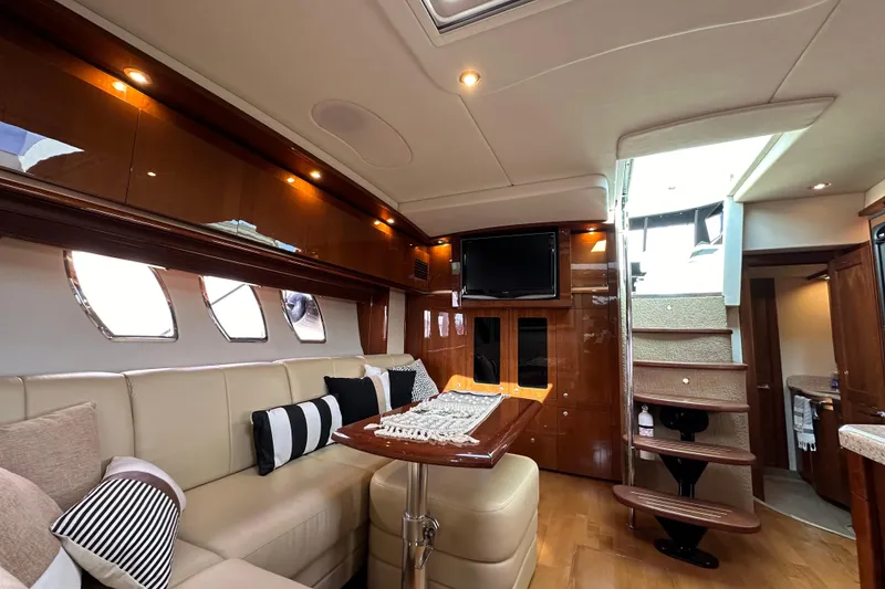 Slide: The Image of Luxurious interior of 2009 Sea Ray 48 Sundancer yacht with elegant seating and modern amenities. - 19