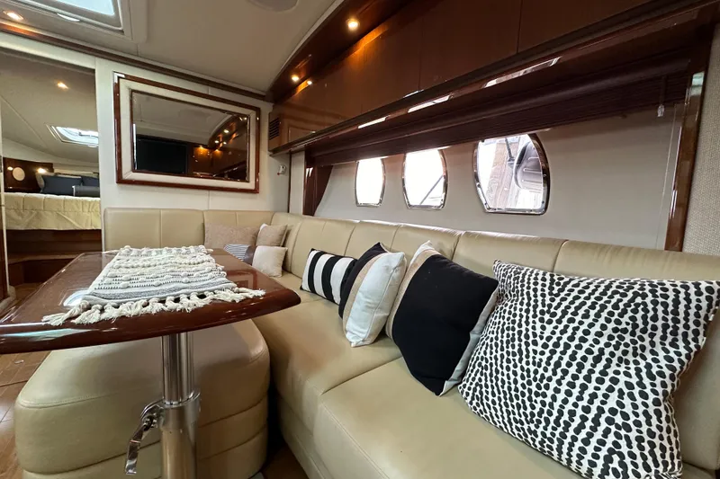 Slide: The Image of Luxurious interior of 2009 Sea Ray 48 Sundancer yacht with elegant seating and decor. - 21