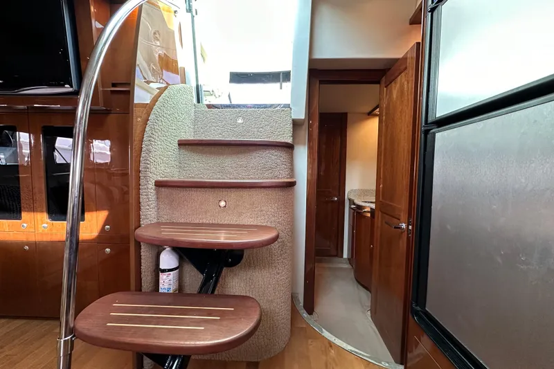 Slide: The Image of Interior of 2009 Sea Ray 48 Sundancer yacht with wooden stairs and modern design. - 31