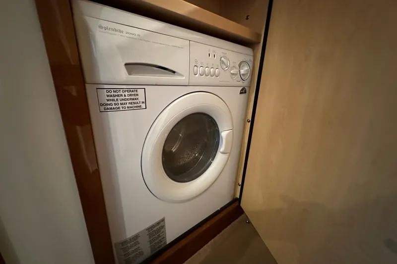Slide: The Image of Splendide 2000 S washer in 2009 Sea Ray 48 Sundancer yacht interior. - 36