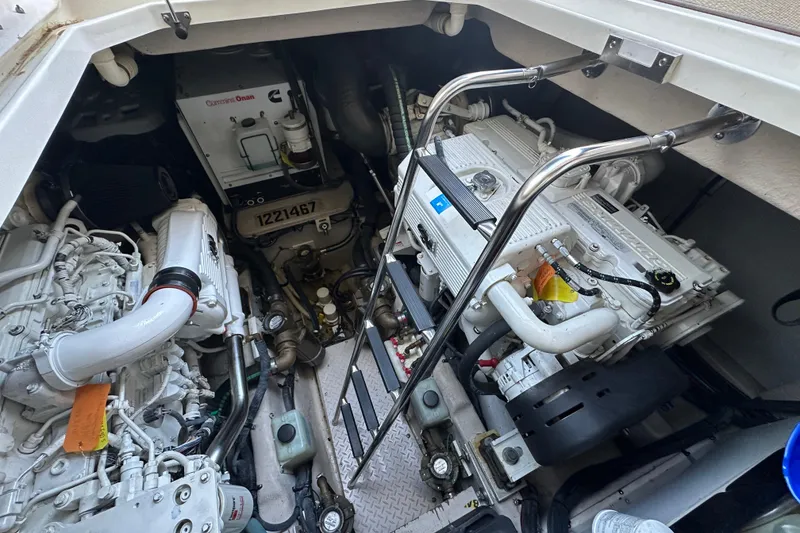 Slide: The Image of Engine room of 2009 Sea Ray 48 Sundancer with Cummins Onan generator and dual engines. - 38