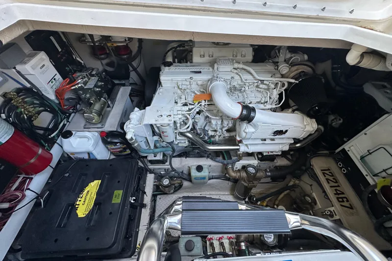 Slide: The Image of Engine room of 2009 Sea Ray 48 Sundancer, showcasing detailed mechanical components. - 39