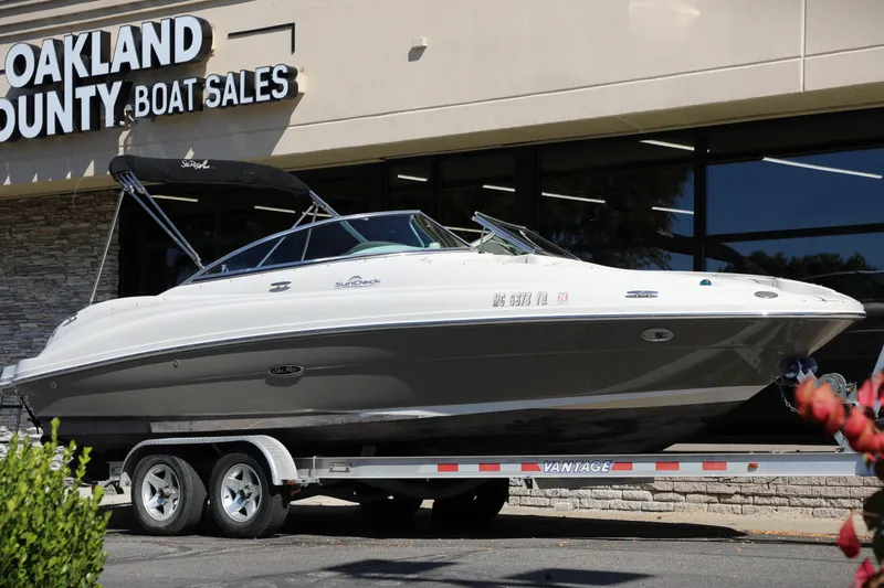 Slide: The Image of 2008 Sea Ray 220 Sundeck boat on trailer at Oakland County Boat Sales. - 0