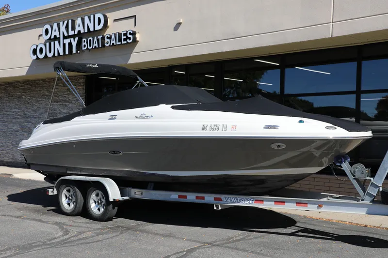Slide: The Image of 2008 Sea Ray 220 Sundeck boat on trailer at Oakland County Boat Sales. - 14