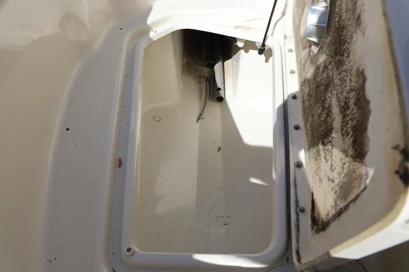 Slide: The Image of Open storage compartment on a 2008 Sea Ray 220 Sundeck boat. - 6
