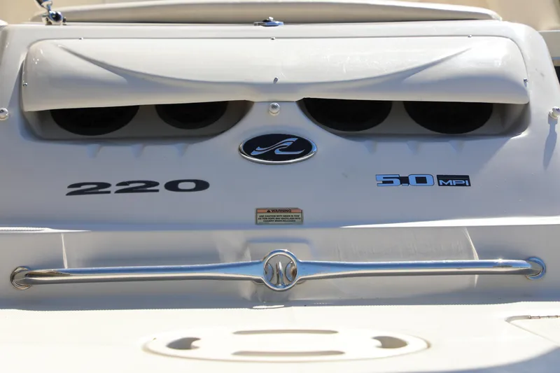 Slide: The Image of 2008 Sea Ray 220 Sundeck boat with 5.0 MPI engine branding. - 7