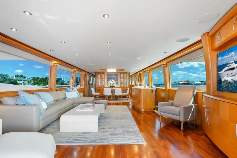 Slide: The Image of Luxurious 2008 Lazzara motor yacht interior with elegant seating and panoramic ocean views. - 12