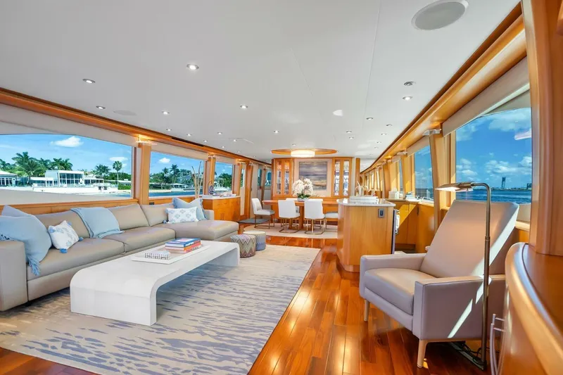 Slide: The Image of Luxurious 2008 Lazzara motor yacht interior with elegant seating and panoramic ocean views. - 13