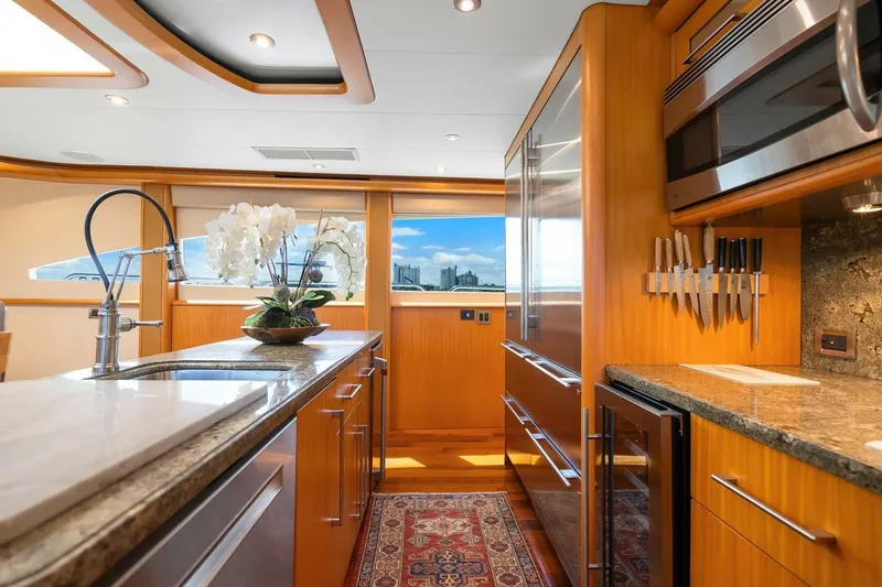 Slide: The Image of Luxurious kitchen interior of 2008 Lazzara Motor Yacht with modern appliances and elegant design. - 20