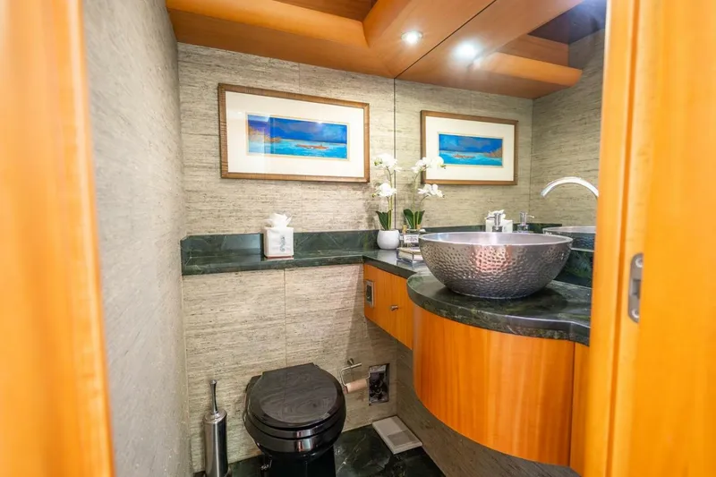Slide: The Image of Luxurious bathroom on 2008 Lazzara Motor Yacht with modern sink and elegant decor. - 21