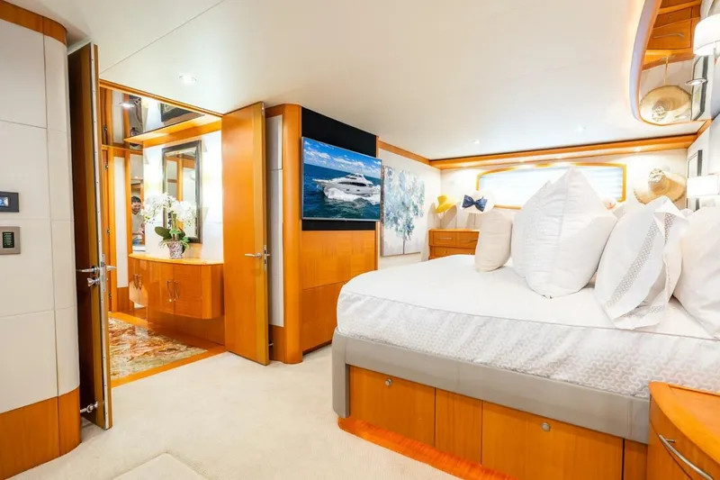 Slide: The Image of Luxurious 2008 Lazzara motor yacht bedroom with elegant decor and modern amenities. - 27