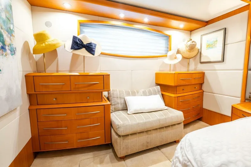 Slide: The Image of Luxurious 2008 Lazzara motor yacht interior with elegant wood cabinetry and stylish decor. - 28