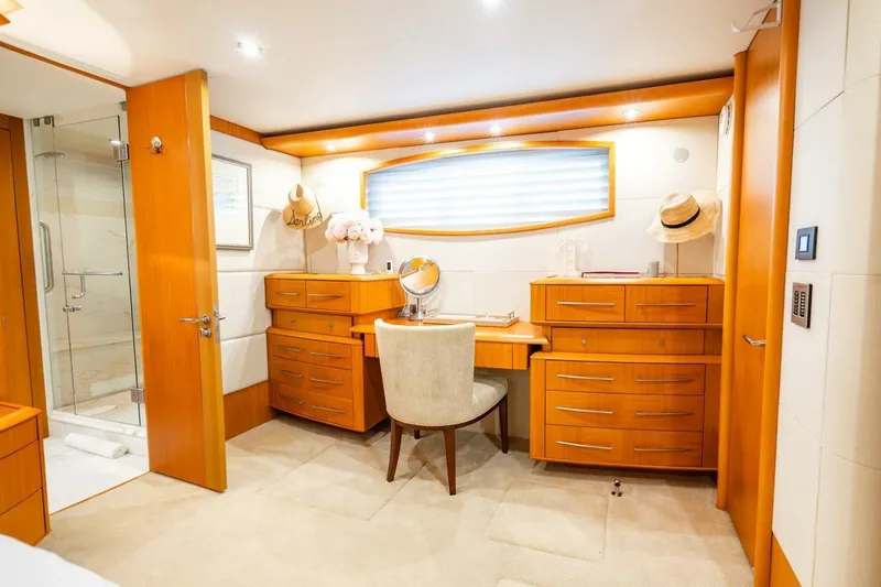 Slide: The Image of Luxurious 2008 Lazzara Motor Yacht interior with elegant wood cabinetry and vanity area. - 29