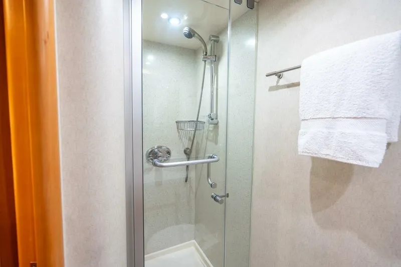 Slide: The Image of Shower area in 2008 Lazzara Motor Yacht with towel rack and glass door. - 39