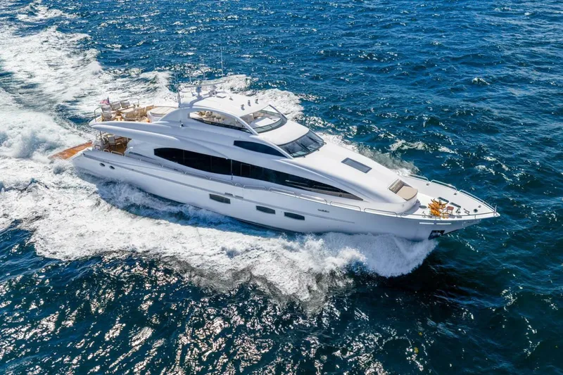Slide: The Image of 2008 Lazzara Motor Yacht cruising on open sea, showcasing sleek design and luxury features. - 4