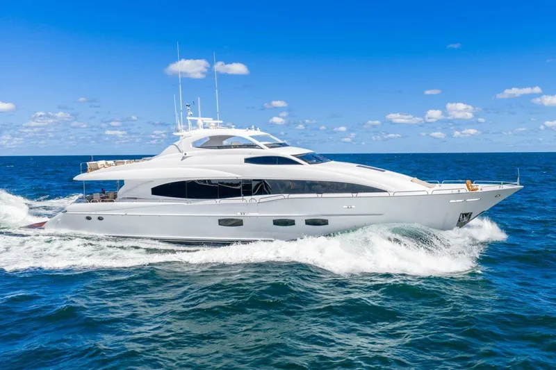Slide: The Image of 2008 Lazzara Motor Yacht cruising on open sea under clear blue sky. - 5