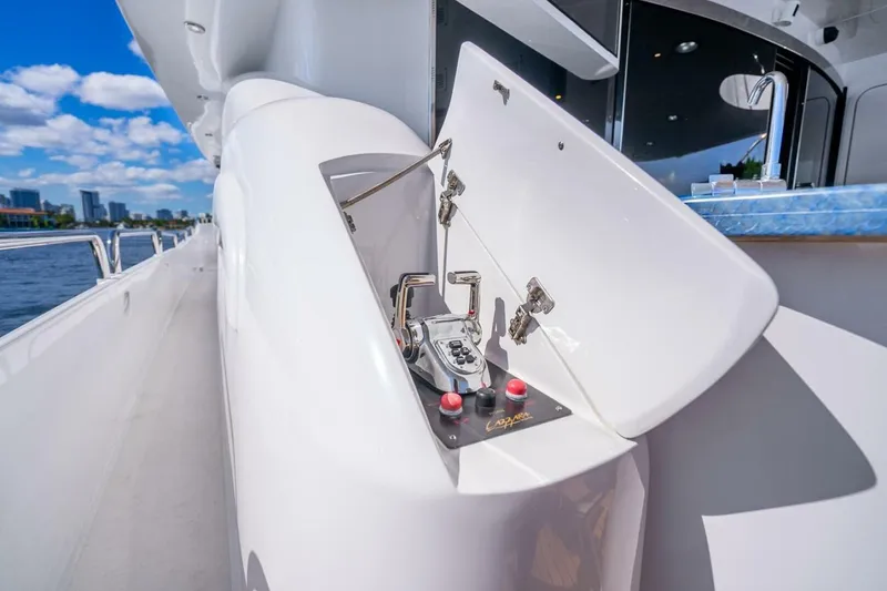 Slide: The Image of 2008 Lazzara Motor Yacht control panel with open hatch, docked by city skyline. - 60