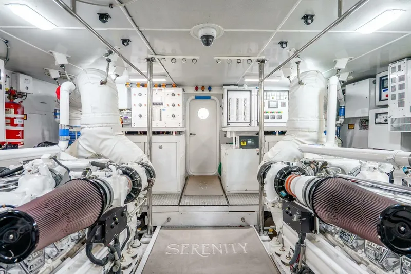 Slide: The Image of Engine room of 2008 Lazzara Motor Yacht, featuring advanced machinery and control panels. - 77