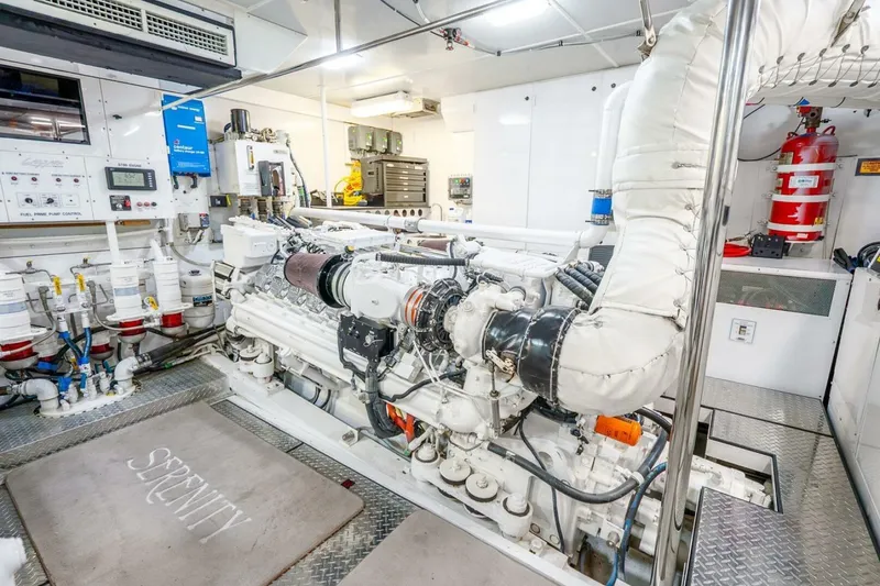 Slide: The Image of Engine room of 2008 Lazzara Motor Yacht, featuring advanced machinery and control systems. - 78