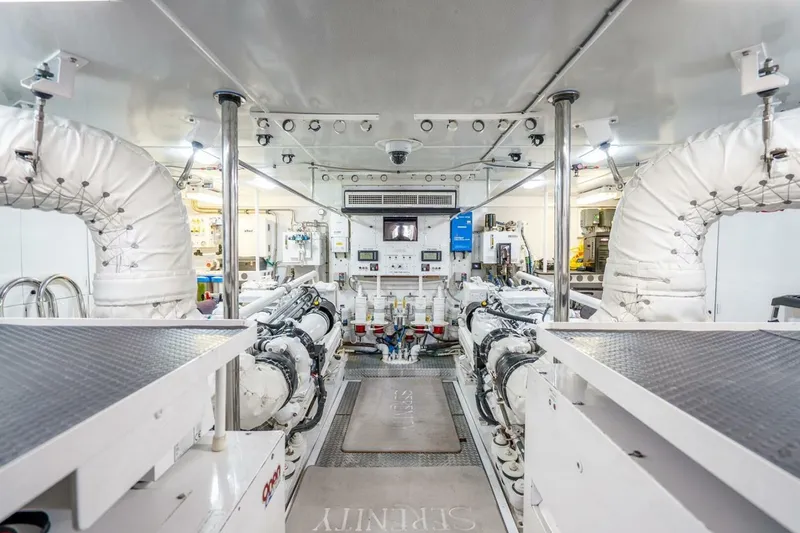 Slide: The Image of Engine room of a 2008 Lazzara Motor Yacht, featuring advanced machinery and equipment. - 79